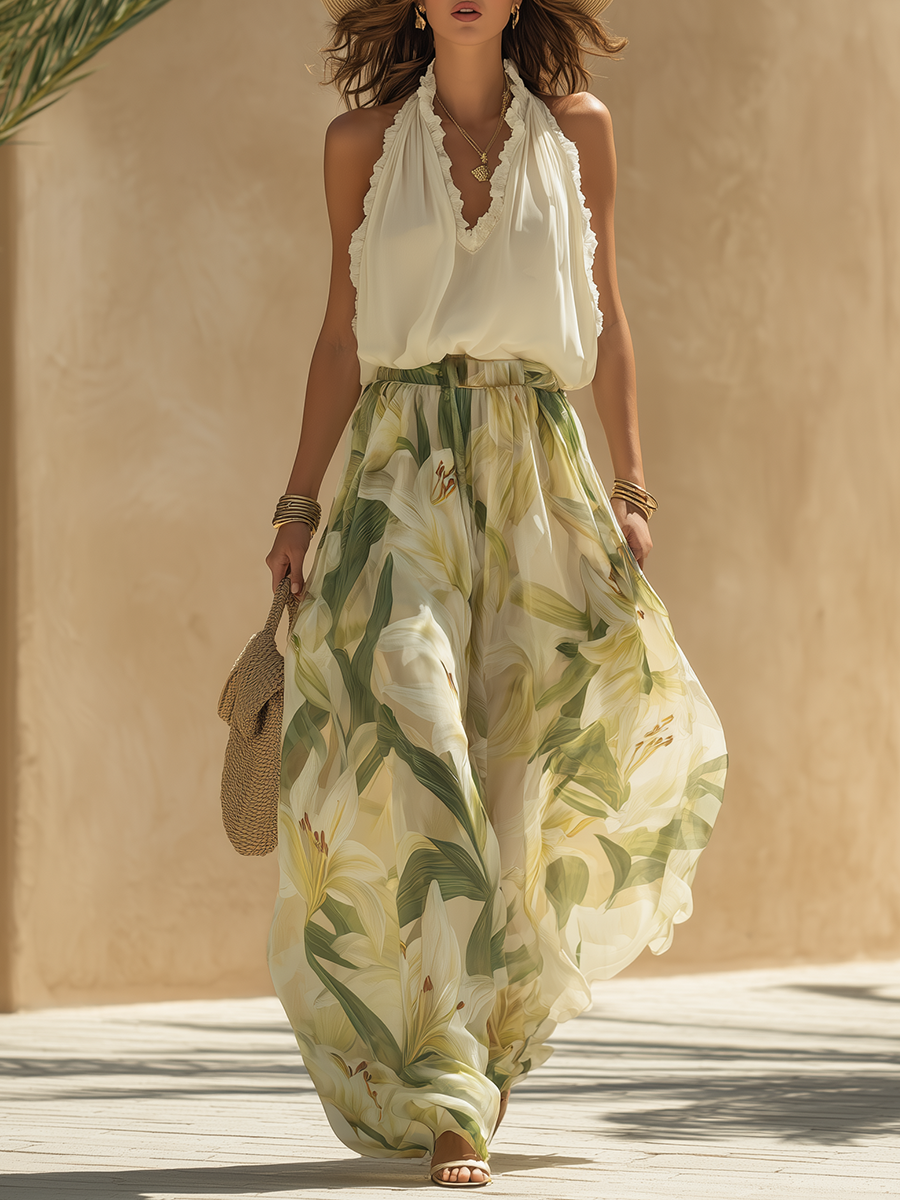 Set coordinato donna elegante, top V-neck e pantaloni palazzo stampati floreali multicolore.