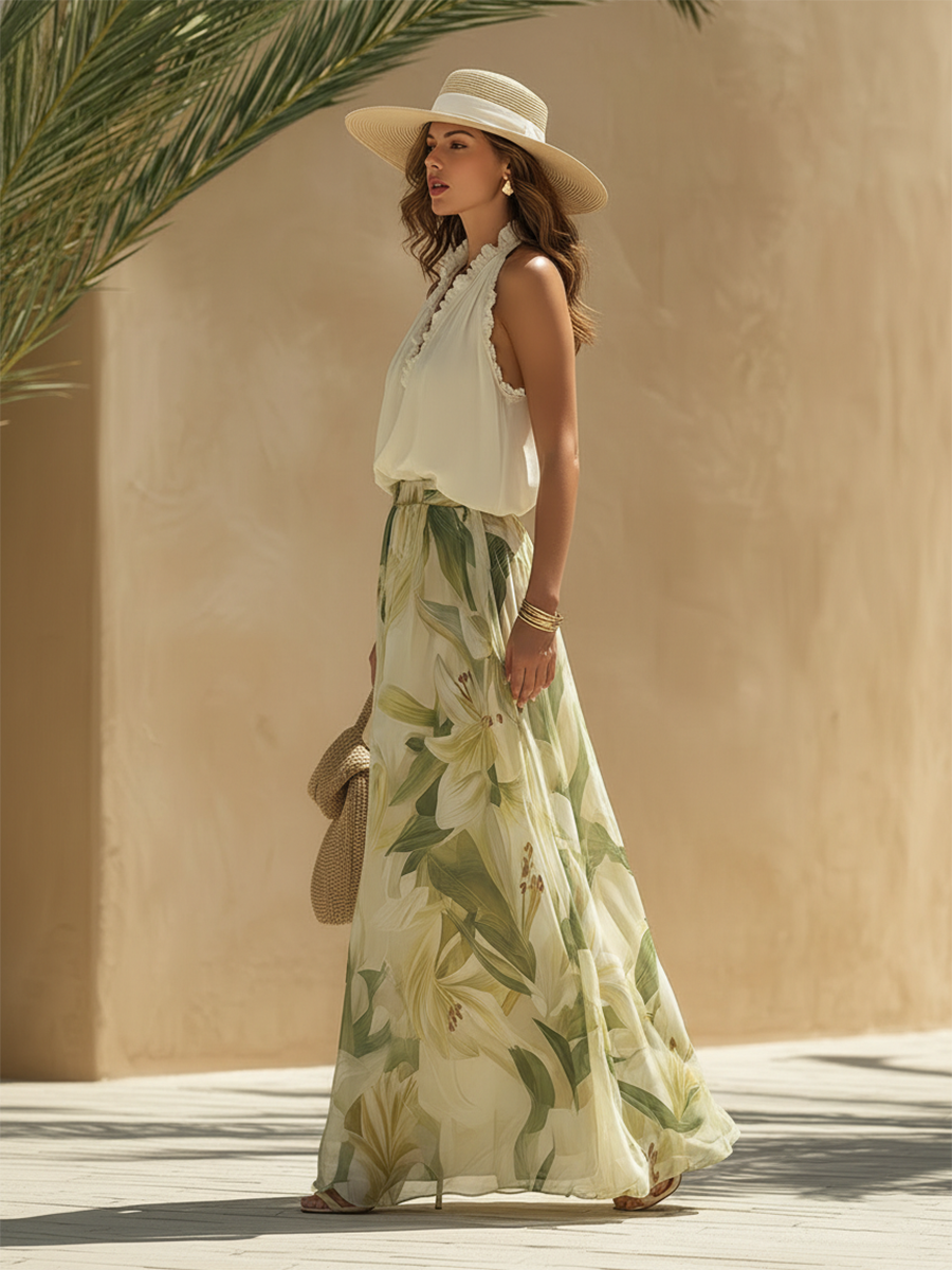 Outfit estivo casual chic: top scollo a V e pantaloni palazzo a gamba larga con stampa floreale.