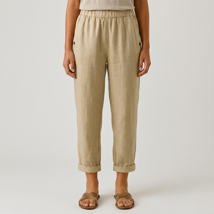 Pantaloni dritti donna con vita elastica e bottoni laterali, ideali per un look casual chic estivo.
