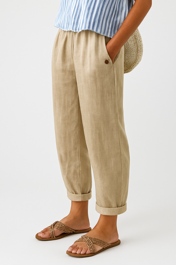 Comodi pantaloni donna dritti a vita elastica, con bottoni laterali; perfetti per abbigliamento casual e versatile.