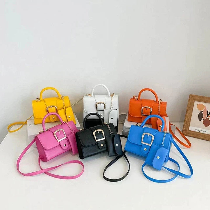 Mini borsa a mano donna multicolore con portamonete, compatta ed elegante. Accessorio moda versatile.