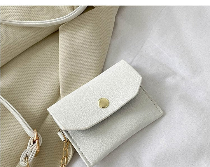Mini borsa donna vivace, multicolore, con portamonete. Accessorio pratico e trendy per l'outfit quotidiano.
