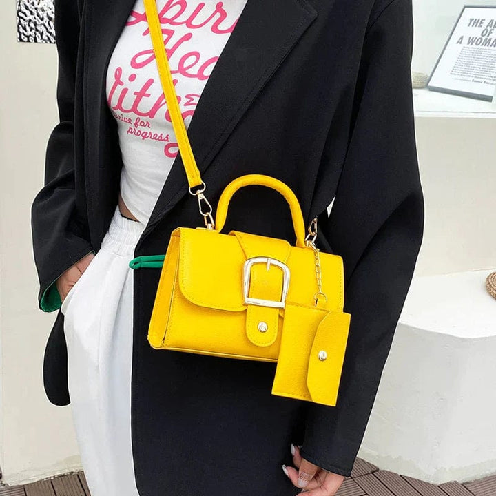 Mini borsa a mano donna, versatile con tracolla removibile e portamonete. Eleganza compatta assicurata.