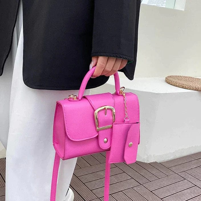 Accessorio donna: mini borsa a mano compatta con portamonete. Look raffinato per la donna moderna.