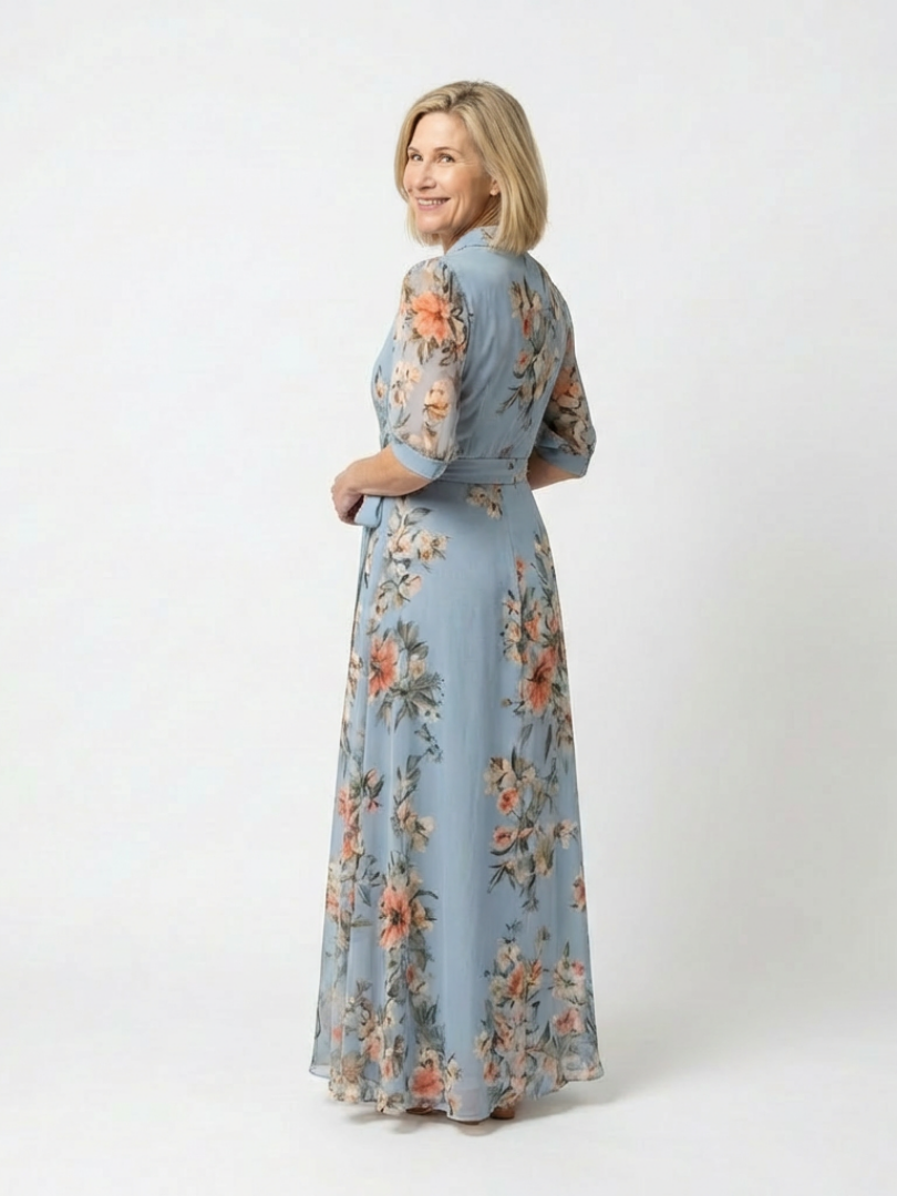 Elegante abito maxi floreale da donna con scollo a V, tessuto fluido e leggero, perfetto per le vacanze.