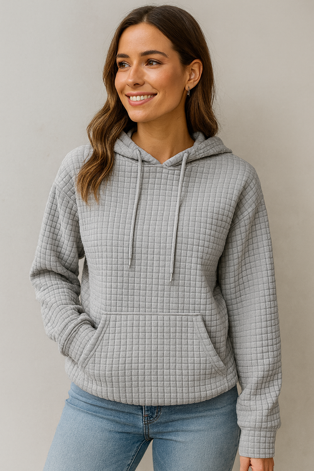 Felpa donna con cappuccio, tasca marsupio e texture unica. Ideale per abbigliamento casual e comfort.