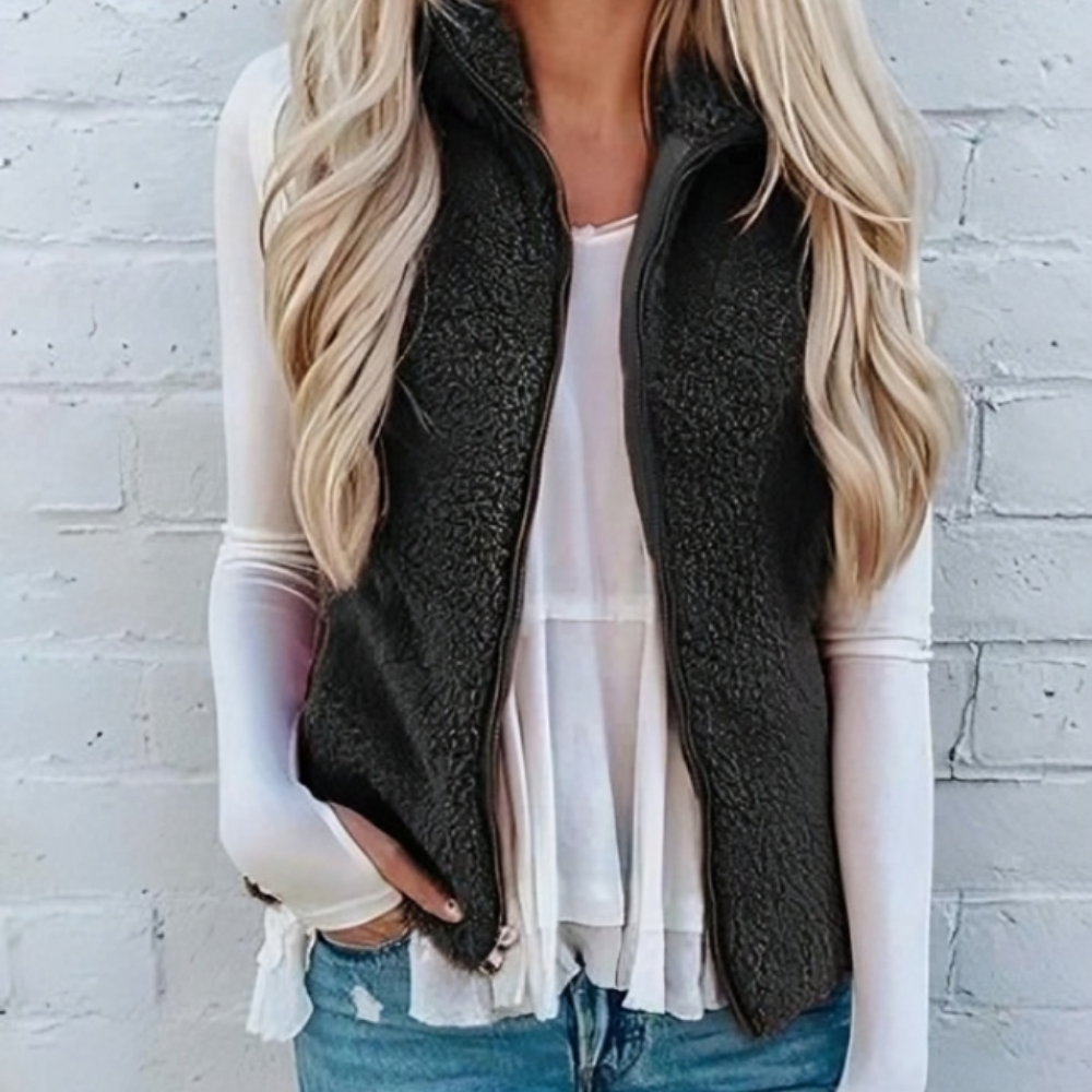Gilet casual da donna con cerniera, essenziale senza maniche per comfort e versatilità in primavera e autunno.