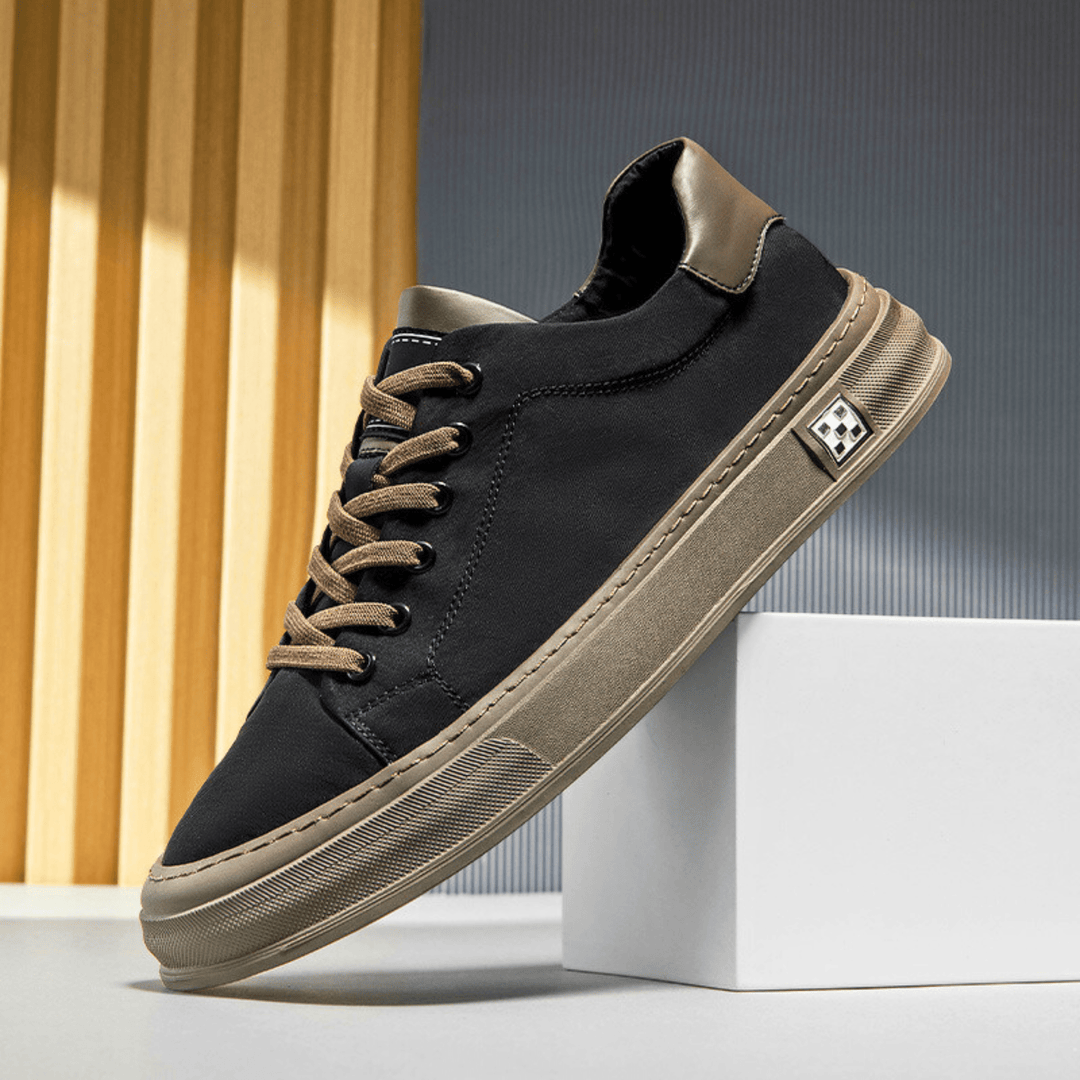 Scarpe uomo basse grigie, traspiranti e confortevoli, perfette per un look sportivo o casual alla moda.