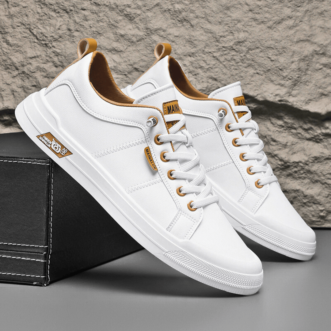 Sneakers basse da uomo, design moderno per uno stile casual quotidiano.