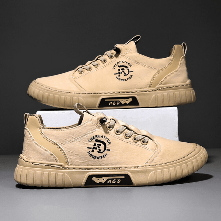 Sneakers uomo casual con suola rialzata e design moderno, perfette per un look urbano confortevole.