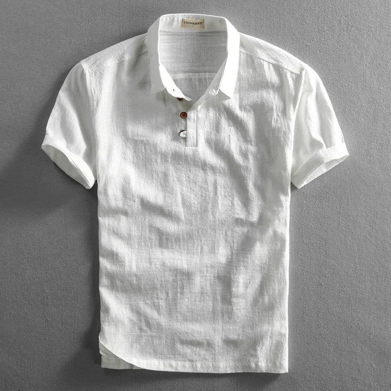 Elegante polo uomo grigia a manica corta, perfetta per un look casual chic. Top uomo comodo e versatile.