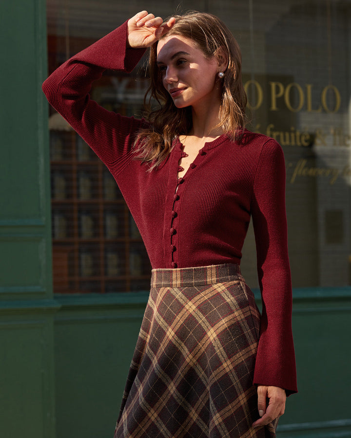 Top donna casual a coste, maniche a campana e bottoni. Perfetto per un look elegante e quotidiano, primavera autunno.