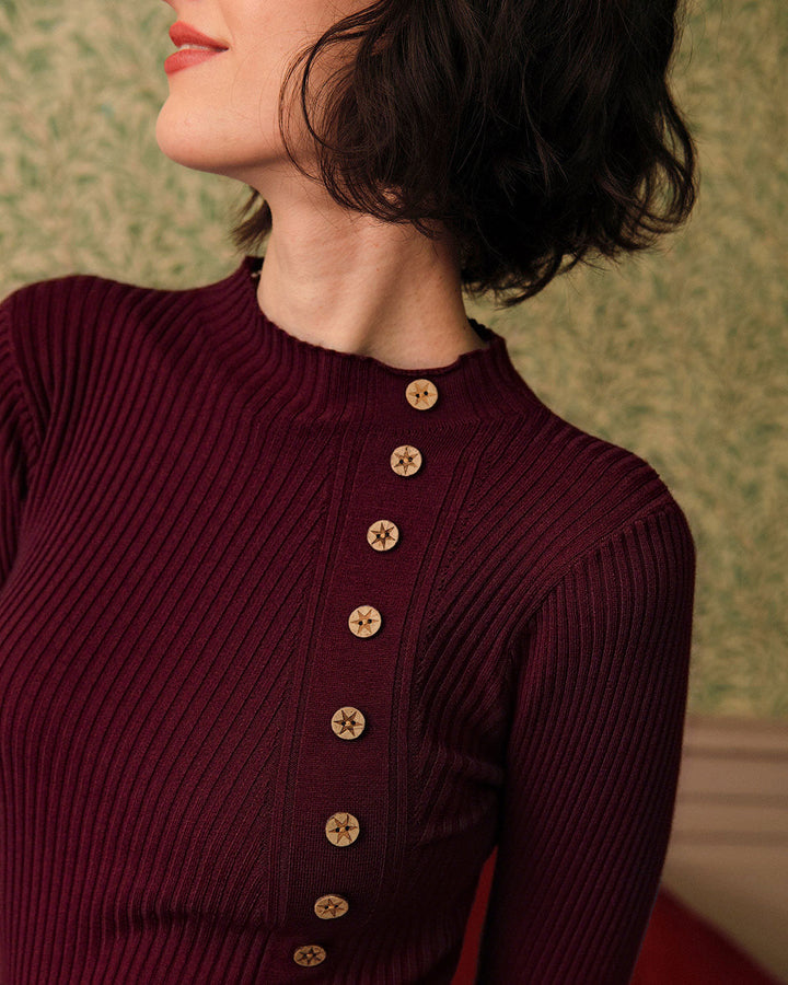 Maglia donna a costine, manica lunga, con collo coreana e bottoni per moda donna quotidiana.