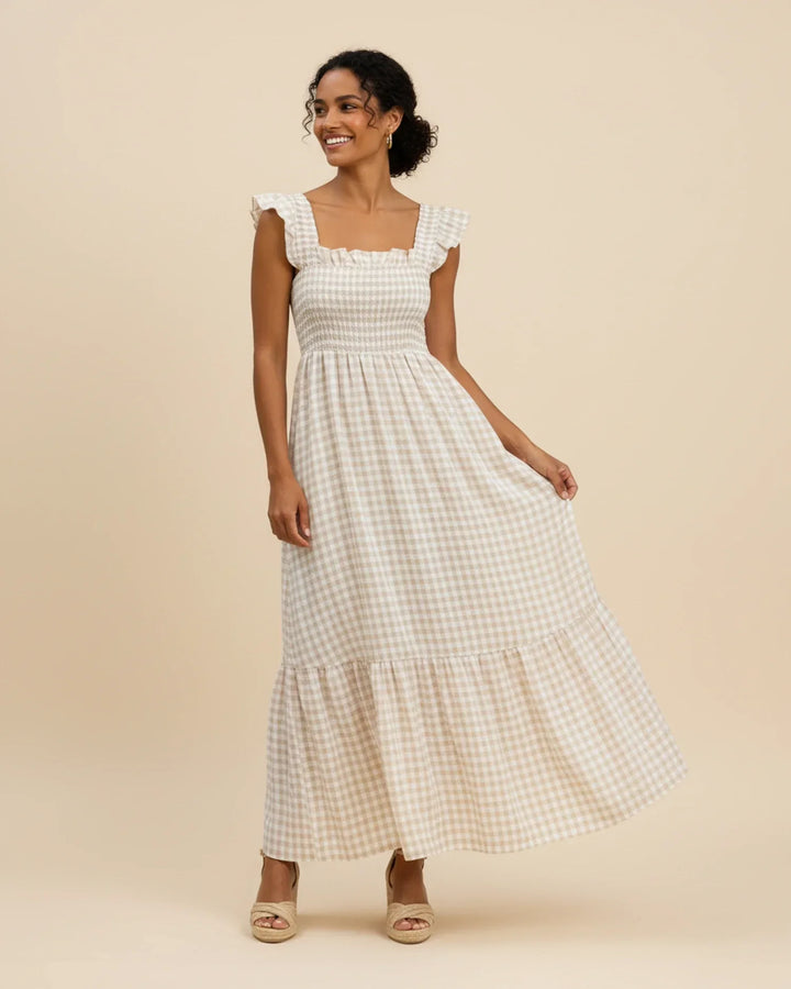 Abito donna lungo a quadretti, collo quadrato, senza maniche, perfetto per look estivi casual.