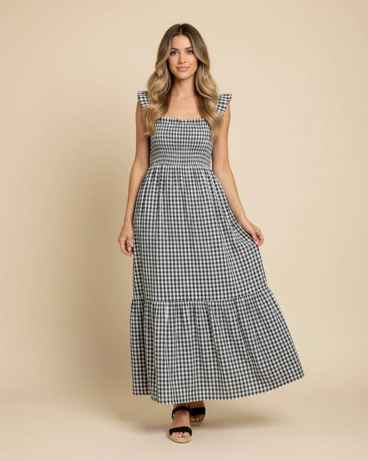 Abito lungo estivo donna a quadretti, senza maniche, collo quadrato, design moderno e confortevole.