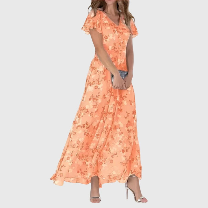 Vestito lungo floreale donna, scollo a V e maniche svolazzanti. Ideale per primavera/estate, look elegante e versatile.