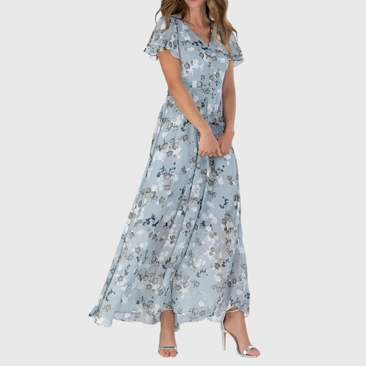 Abito lungo floreale A-line donna con scollo a V. Maniche svolazzanti, ideale per primavera/estate elegante e casual.