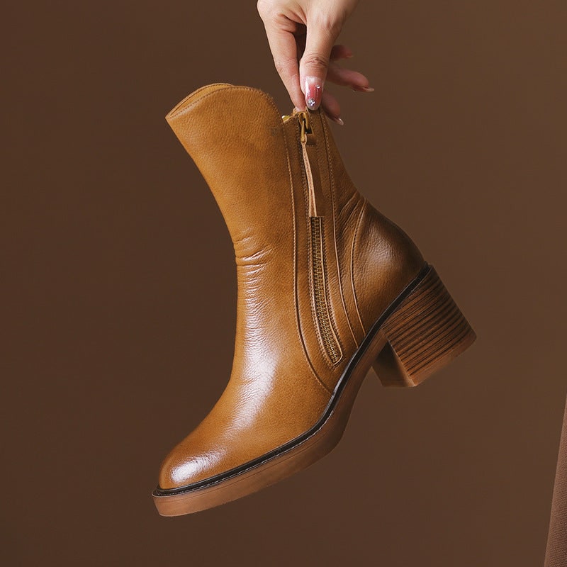 Stivaletti donna con tacco largo, doppie cerniere laterali. Scarpe eleganti e comode per ogni stagione.