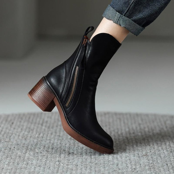 Stivaletti neri donna eleganti con tacco largo e doppie cerniere. Perfetti per l'autunno inverno e facili da abbinare.
