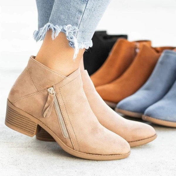 Stivaletti tacco basso per donna, design moderno con cerniera laterale. Comodi e alla moda per l'inverno.
