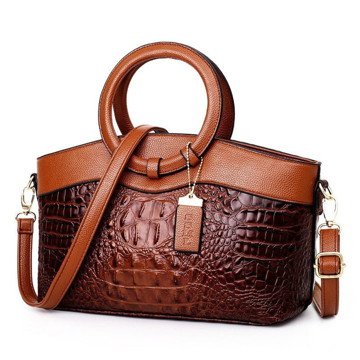 Borsa donna elegante ecopelle stampa coccodrillo nera con dettagli dorati, tracolla.