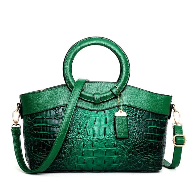 Borsa elegante da giorno/sera in ecopelle coccodrillo, manici e hardware dorati.