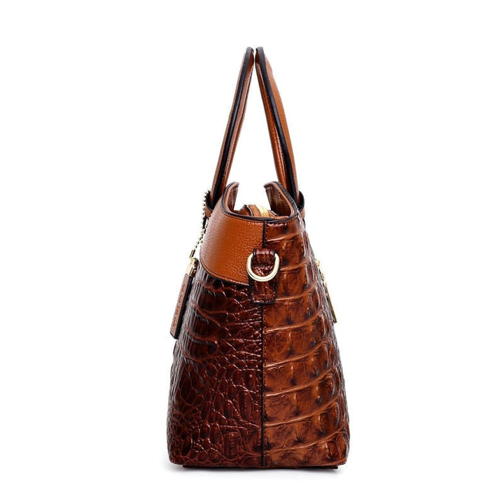 Borsa strutturata da donna, design effetto coccodrillo, manico e tracolla per versatilità.