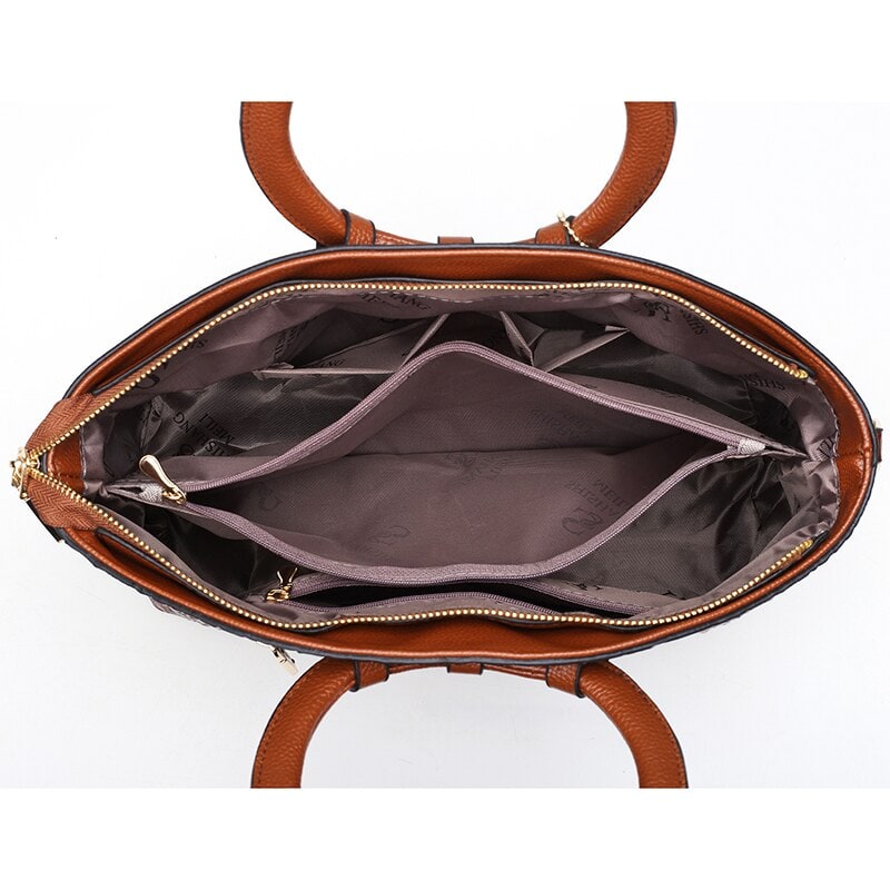 Accessorio donna chic: borsa in ecopelle coccodrillo, finiture oro, look lussuoso.