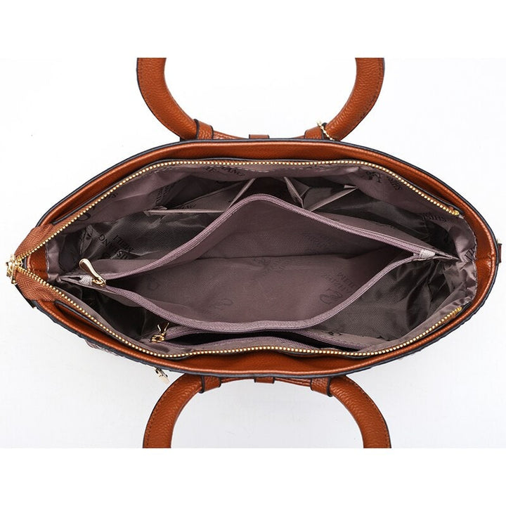 Accessorio donna chic: borsa in ecopelle coccodrillo, finiture oro, look lussuoso.