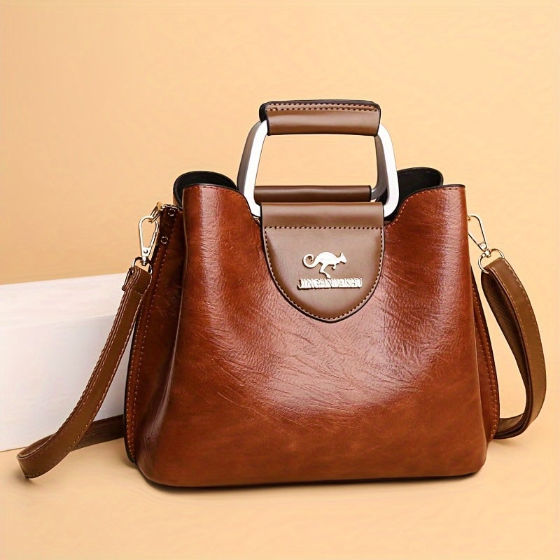 Borsa da donna in ecopelle testurizzata, design elegante e moderno, perfetta come accessorio moda tracolla.