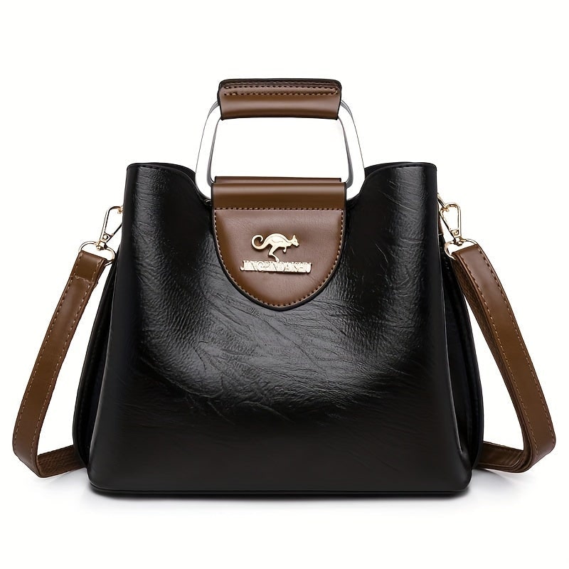 Borsetta da donna versatile in ecopelle, con tracolla, ideale per un look quotidiano elegante e pratico.