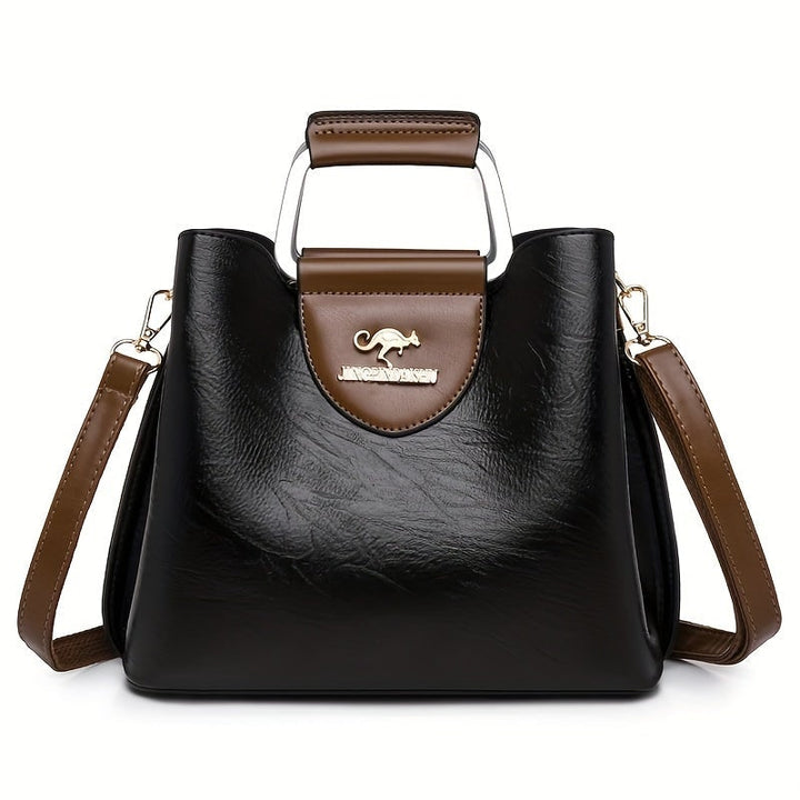Borsetta da donna versatile in ecopelle, con tracolla, ideale per un look quotidiano elegante e pratico.