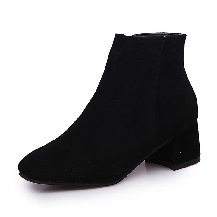 Stivaletti donna casual con tacco grosso, perfetti per l'autunno. Calzature comode ed eleganti con cerniera.