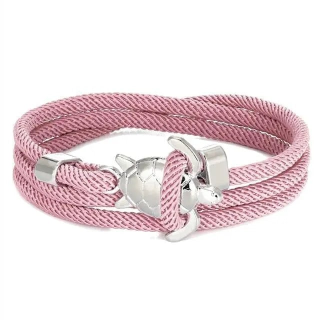 Elegante bracciale da donna intrecciato, tema oceano, con charm tartaruga marina. Accessorio moda.