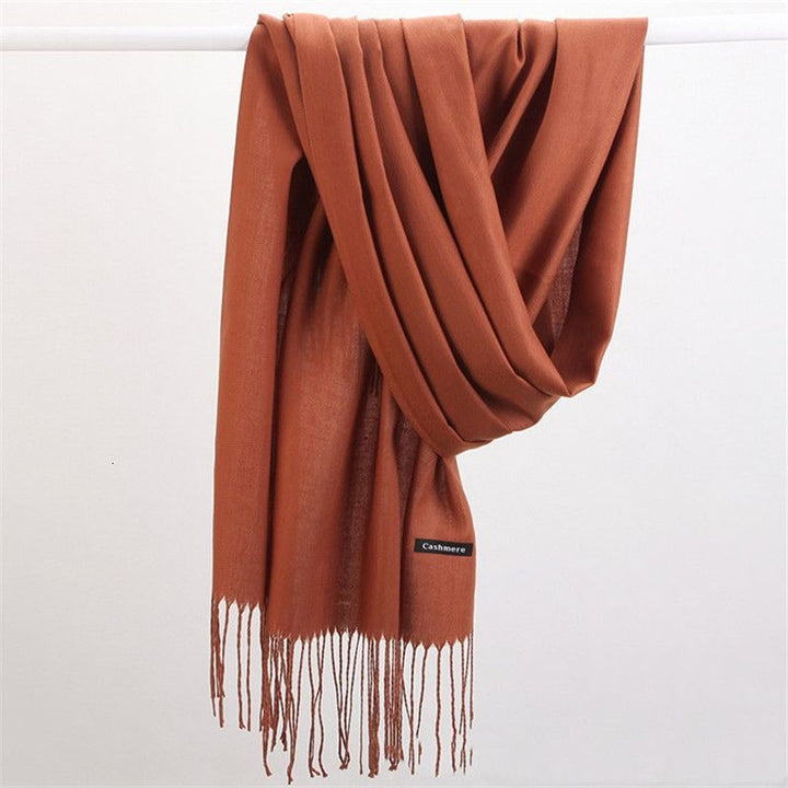Perfetta sciarpa invernale da donna, in cashmere avvolgente, con nappe e stile lussuoso.