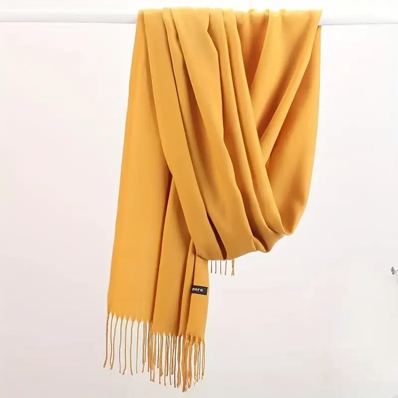 Elegante sciarpa in cashmere avvolgente per donna, con nappe, per un tocco di lusso invernale.