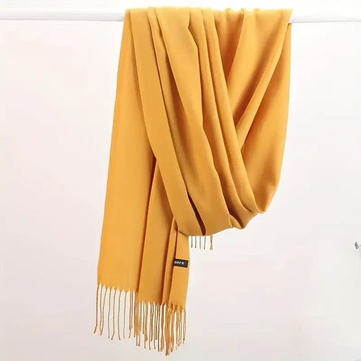 Elegante sciarpa in cashmere avvolgente per donna, con nappe, per un tocco di lusso invernale.