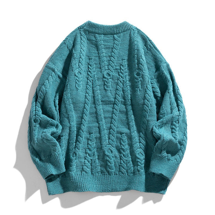 Comodo maglione donna oversize girocollo con raffinate trecce, ideale per un look casual elegante autunnale.