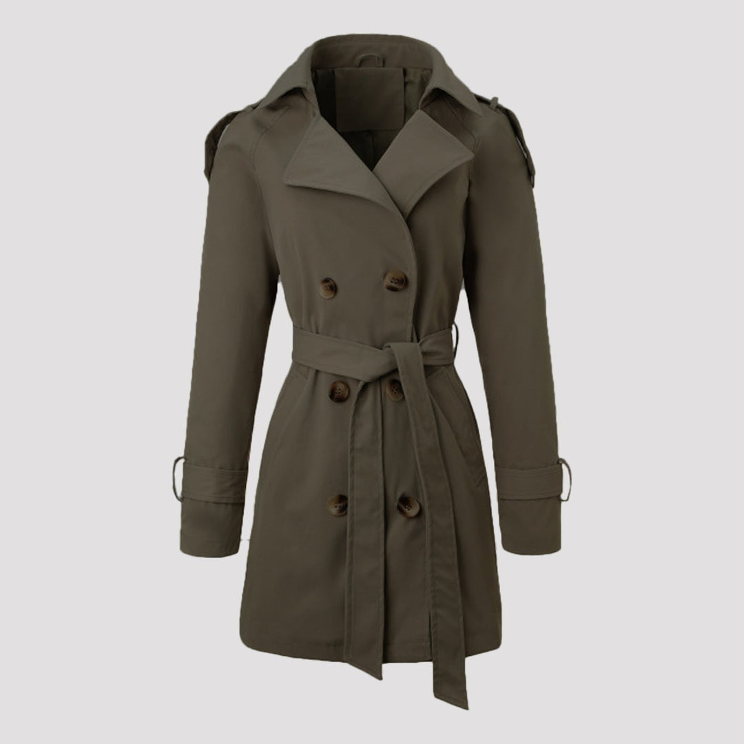 Trench donna doppiopetto verde militare con cintura, un classico outerwear versatile per ogni occasione.