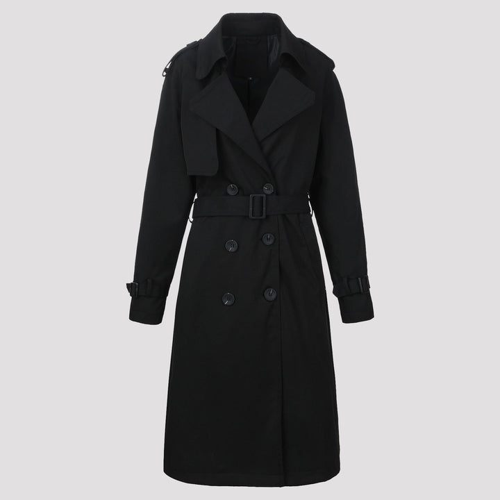 Capospalla donna: trench lungo doppiopetto con cintura e rever a tacca, stile classico per l'ufficio e occasioni formali.