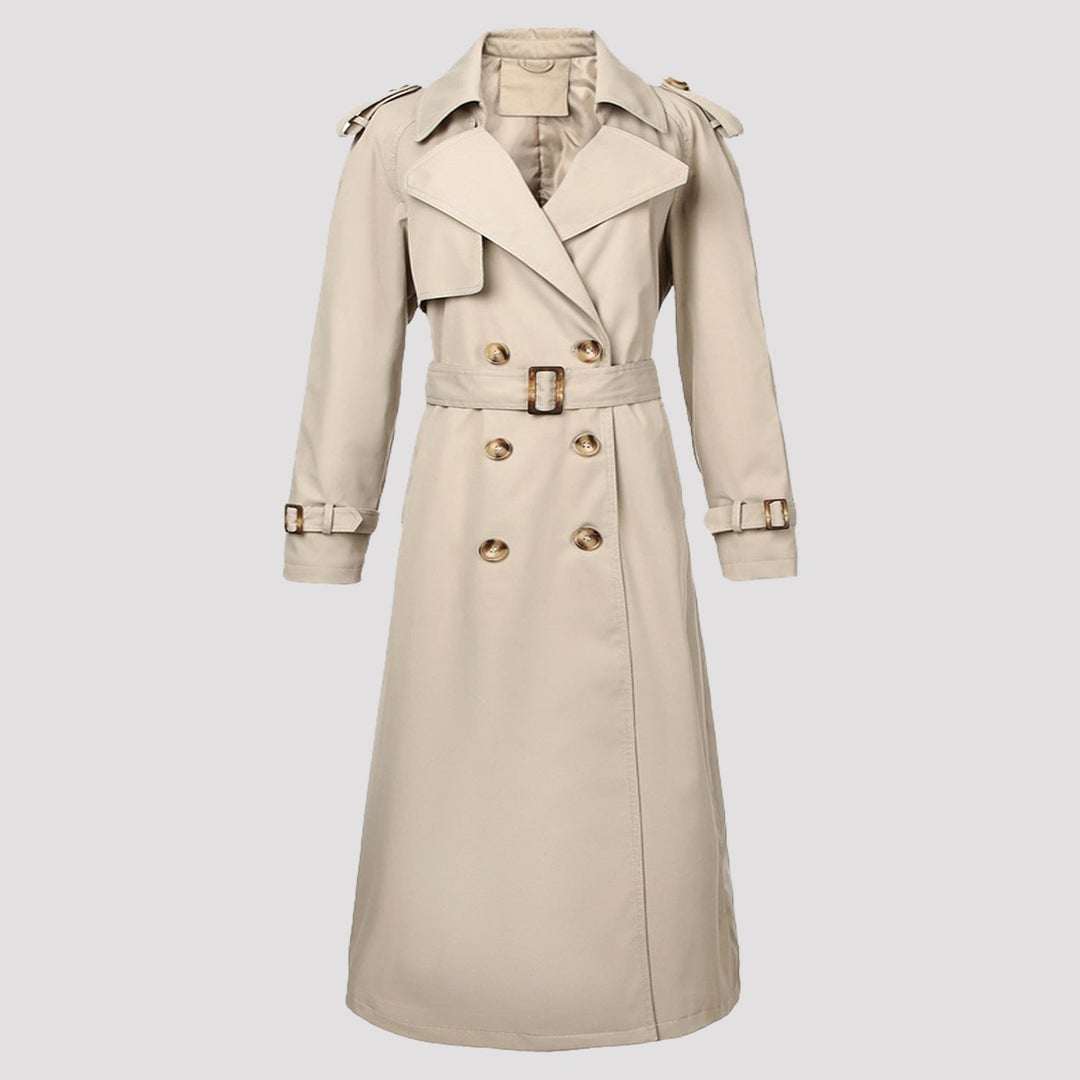 Trench donna lungo doppiopetto con cintura, versatile e chic. Un capospalla essenziale per la moda autunnale e primaverile.