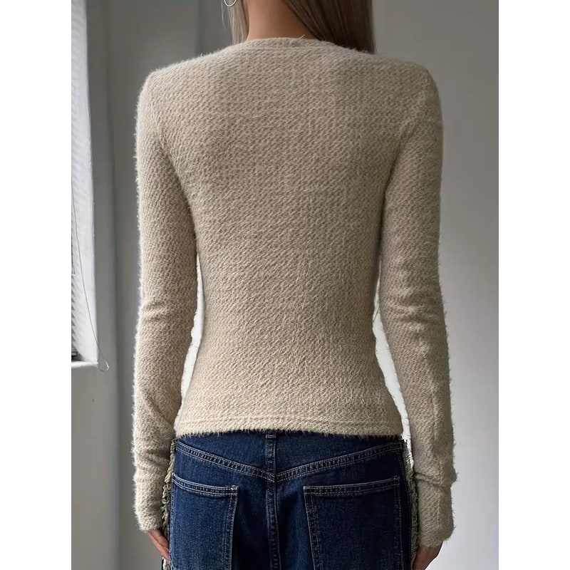 Morbido top donna a maniche lunghe, maglia corta con girocollo, comoda e di tendenza per l'inverno.