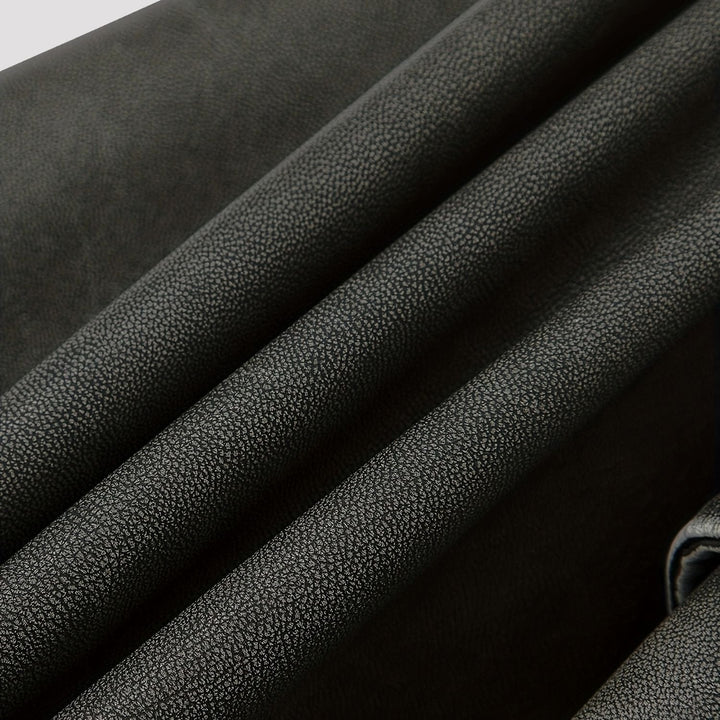 Elegante giacca moto donna grigia, design asimmetrico e taglio cropped. Perfetta per moda femminile.