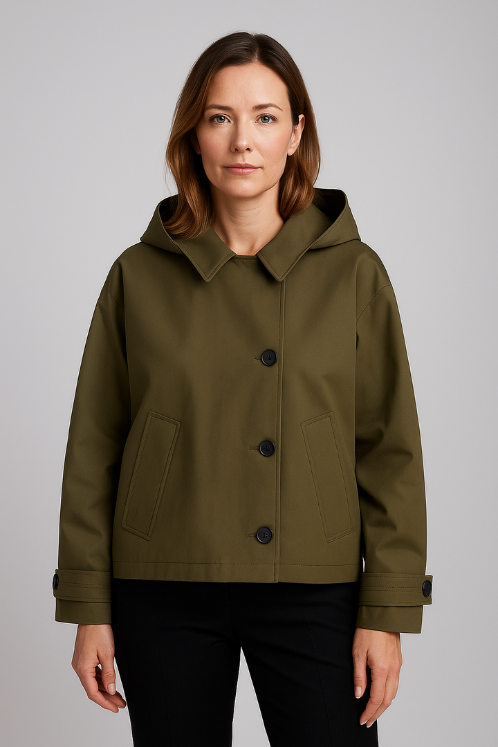 Trench corto donna elegante, con cappuccio rimovibile e collo a punta. Stile versatile per primavera/autunno.