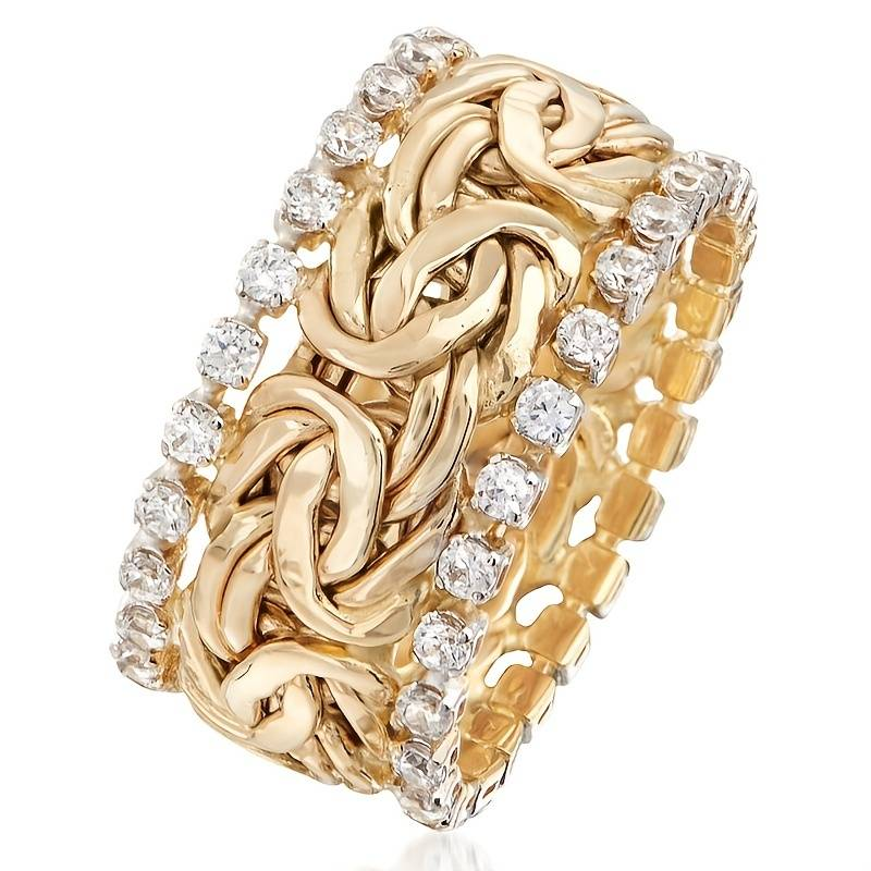 Anello donna elegante fascia larga placcato oro con zirconi intrecciati, un gioiello moda versatile e scintillante.