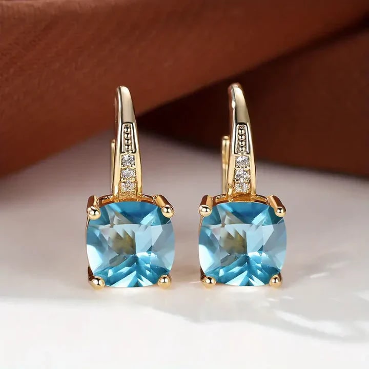 Orecchini da donna con gemma preziosa taglio cuscino, placcati oro, pendenti leverback, chic e brillanti.
