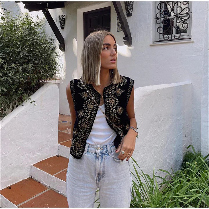 Gilet donna bohemien ricamato con paillettes oro e argento, senza maniche, per stile elegante e chic.