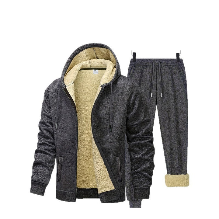 Tuta invernale da donna con felpa calda con cappuccio e pantaloni. Perfetta per il comfort quotidiano e attività leggere.