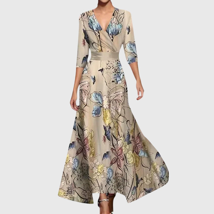 Maxi dress floreale da donna, scollo a V, manica lunga e tasche, ideale per un look comodo ed elegante.