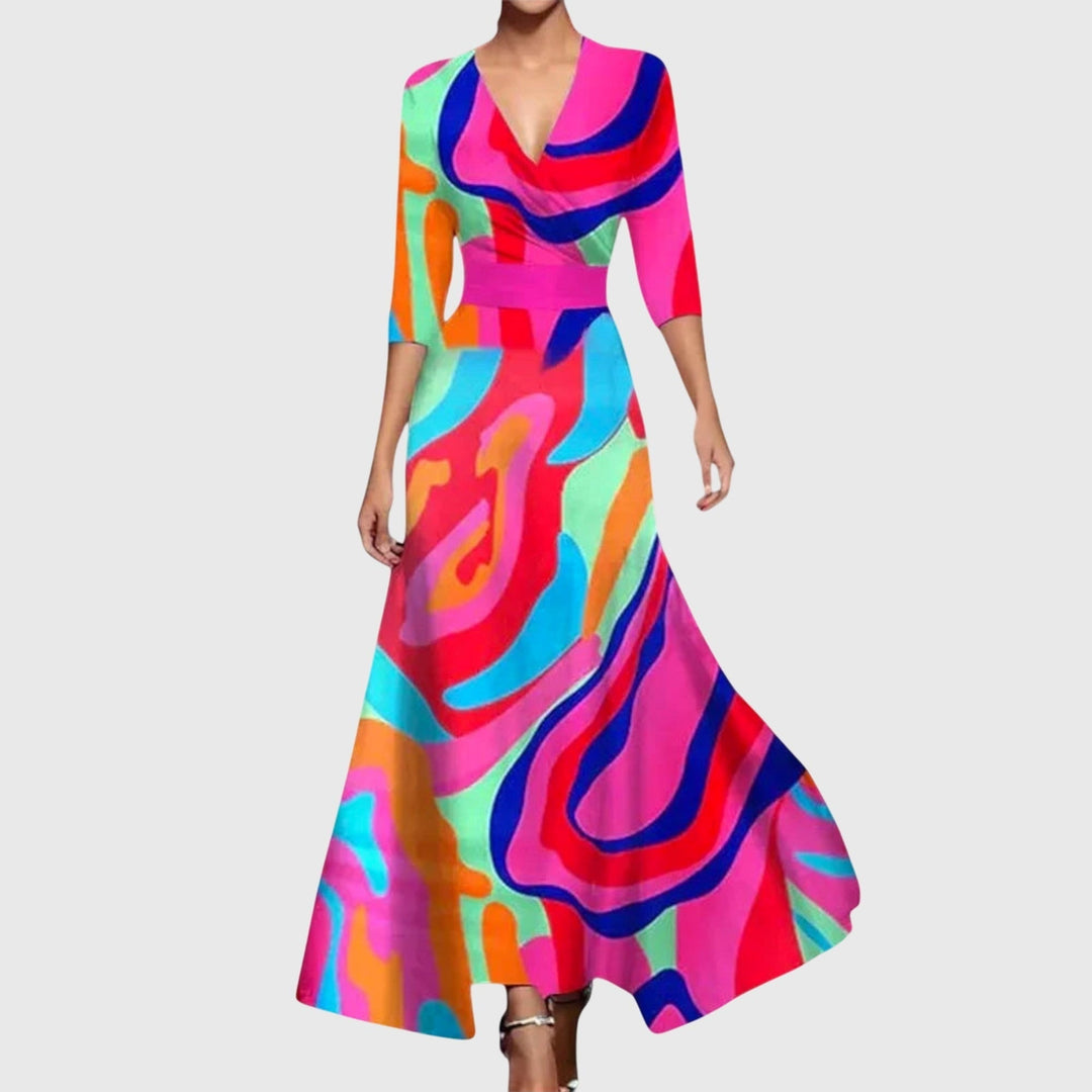 Elegante abito maxi floreale da donna, scollo a V e tasche, perfetto per un look casual estivo chic.